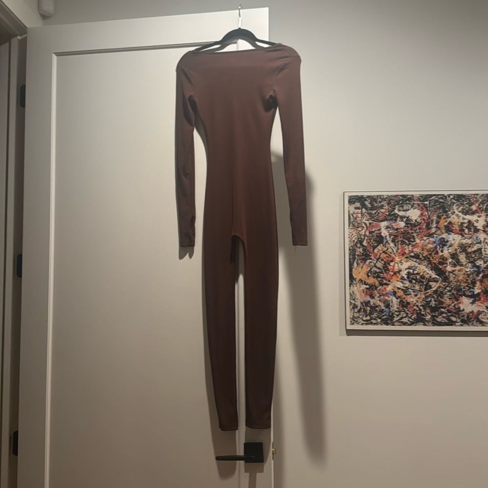 Brown body suit